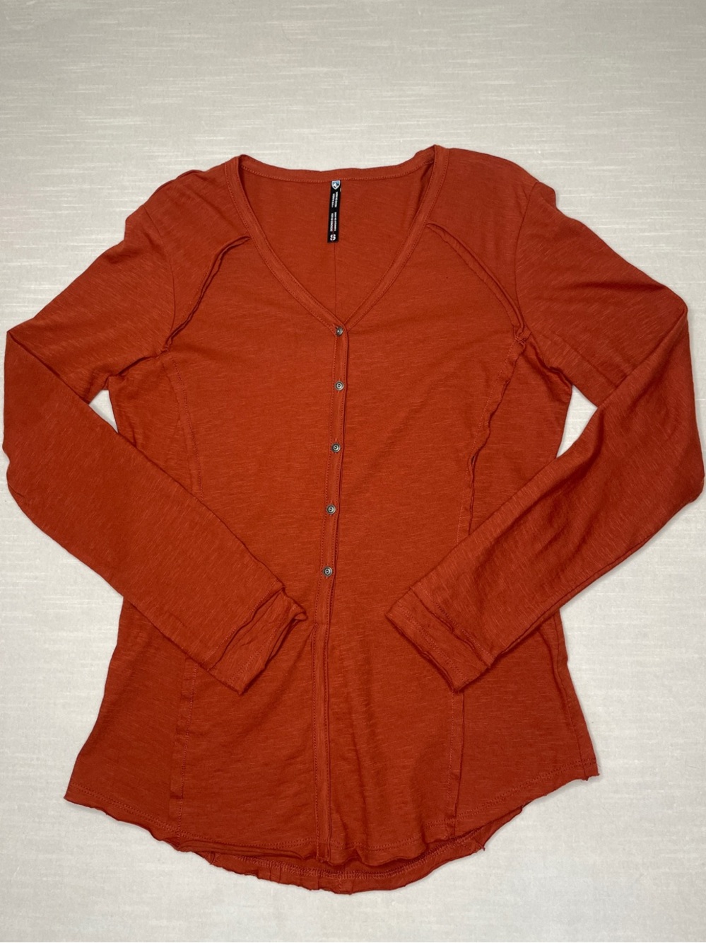 KUHL Women's Henley Long Sleeve Top Size Small Half Button Closure Rust Color